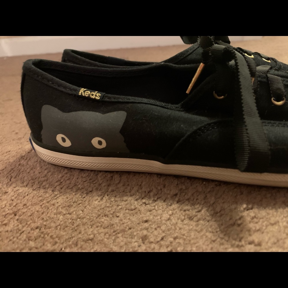 Lightly used Taylor Swift “sneaky cat” Keds shoes.